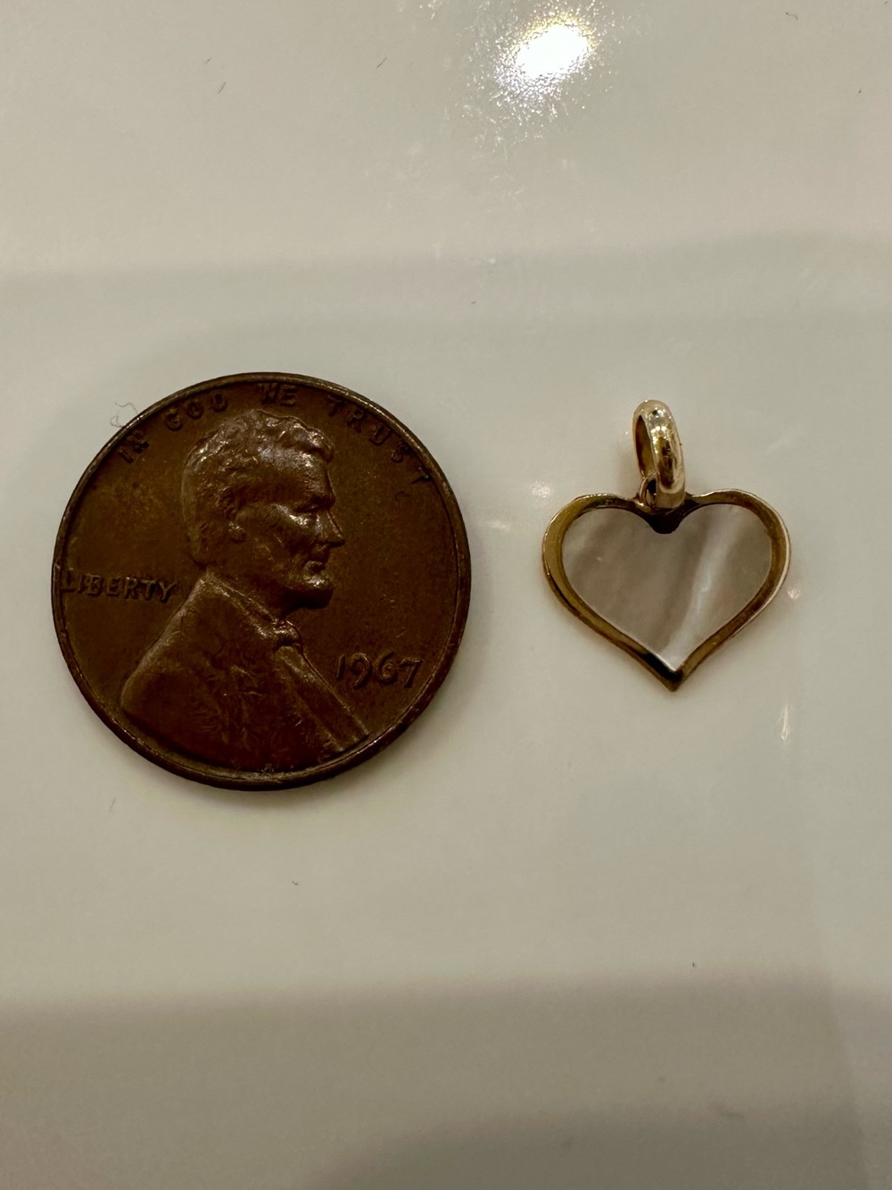 Heart-Shaped Mother of Pearl Pendant in 14k yellow gold